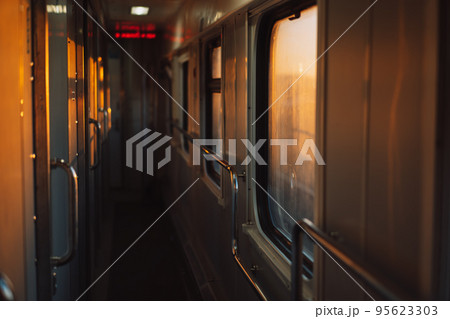 Empty compartment corridor of train carriage 95623303