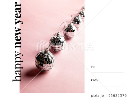 Image of have a happy new year and disco balls in row on pink background 95623576