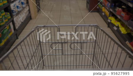 Image of financial data processing over shopping cart 95627995