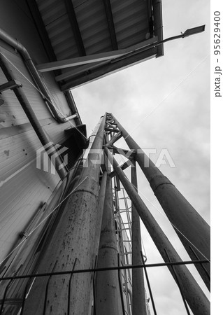 Pipeline near wall industrial building Pipeline near wall industrial building 95629400