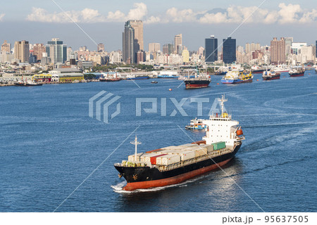 The container ship is leaving the Port of Kaohsiung, Taiwan. 95637505
