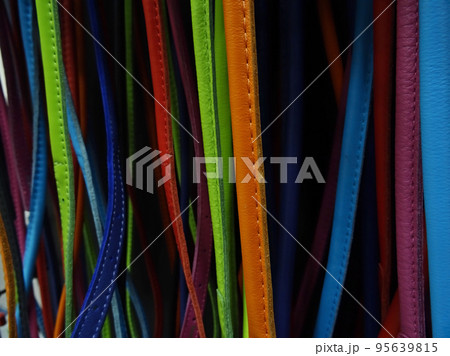 Multicolored leather stripes texture background 95639815