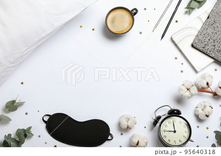 Composition with sleeping mask on white background, top view. Bedtime accessories Composition with sleeping mask on white background, top view. Bedtime accessories 95640318