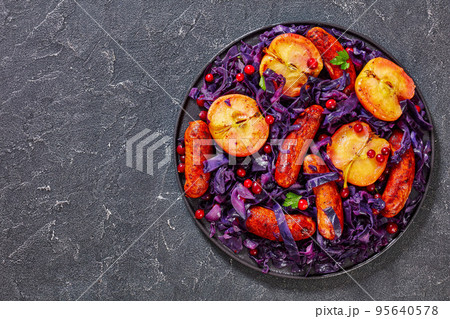 Seared Sausage, Red Cabbage and Apples on plate Seared Sausage, Red Cabbage and Apples on plate 95640578
