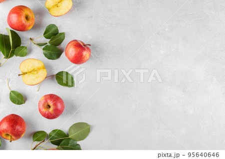 Ripe red apples in wooden box top view on rustic table. Wide apple banner with space for your text Ripe red apples in wooden box top view on rustic table. Wide apple banner with space for your text 95640646
