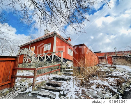 View of a farmhouse in the skansen museum in Stockholm. View of a farmhouse in the skansen museum in Stockholm. 95641044