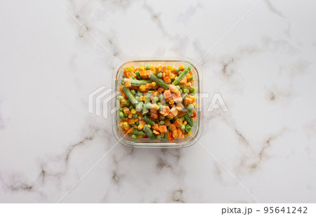 Frozen vegetables in container Frozen vegetables in container 95641242