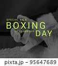 Square image of santa claus holding gift and boxing day up to 50 percent text 95647689
