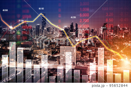 Declining graphs of a stock market crash overlap modernistic city. 95652844
