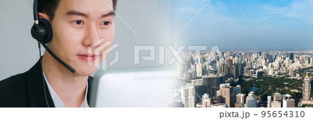 Business people wearing headset working in office in widen view 95654310