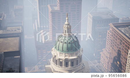 skyscrapers covered by morning fog 95656086