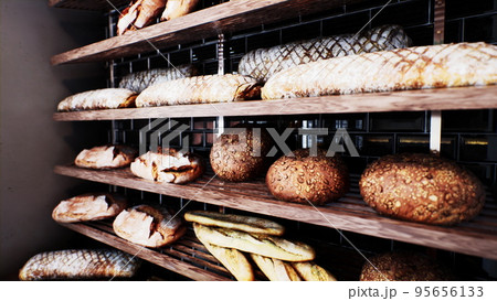 Fresh bread on shelves in bakery Fresh bread on shelves in bakery 95656133