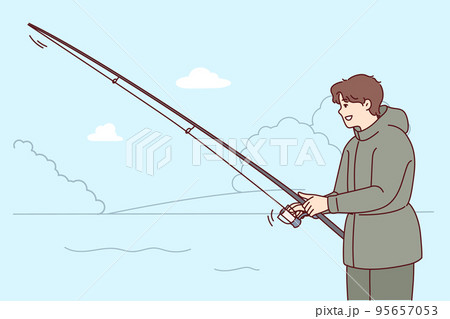 Smiling man with fishing rod outdoors  95657053
