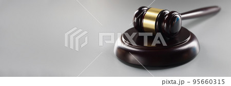Brown judge wooden hammer on soundboard, attorney instrument for legal service Brown judge wooden hammer on soundboard, attorney instrument for legal service 95660315