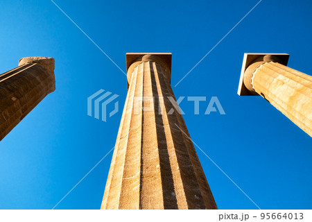 Doric columns at Lindos Acropolis in Rhodes island in Greece 95664013