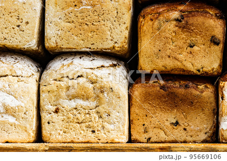 Many rustic fresh bread loaves 95669106