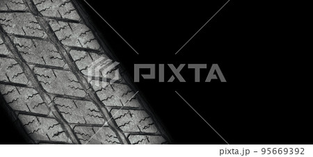 Old vehicle tire texture background , tire tread wear out Old vehicle tire texture background , tire tread wear out 95669392