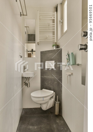Interior of contemporary bathroom with shower and toilet in minimal style flat 95669501