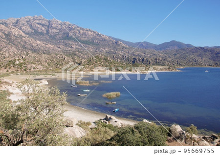 Fishing boats moored along the shore of Lake Bafa in Turkey. Fishing boats moored along the shore of Lake Bafa in Turkey. 95669755