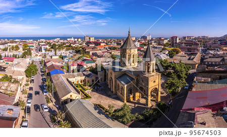 Aerial drone view to old town Derbent, caspian sea and Armenian Church of the Holy Saviour Surb Amenaprkich. Now Museum of Carpet and Decorative and Applied Arts. Republic of Dagestan, Russia Aerial drone view to old town Derbent, caspian sea and Armenian Church of the Holy Saviour Surb Amenaprkich. Now Museum of Carpet and Decorative and Applied Arts. Republic of Dagestan, Russia 95674503