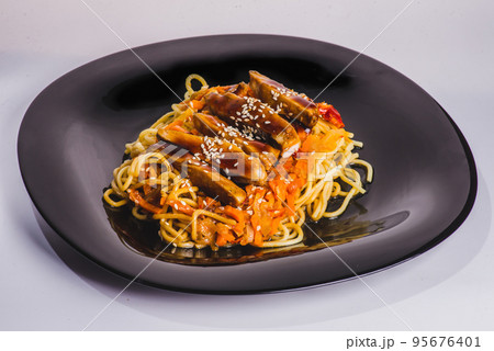 Japanese ramen noodle soup with chicken, corn, scallions, rice noodles Japanese ramen noodle soup with chicken, corn, scallions, rice noodles 95676401