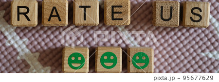 Text rate us and green positive emoticons Text rate us and green positive emoticons 95677629