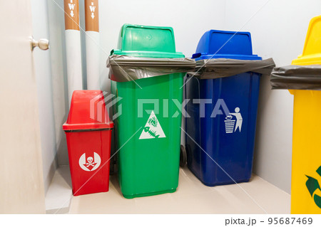Colorful trash dustbin, Red, green, blue and yellow bin for Hazardous, Biodegradable, General and Recyclable waste. recycling management, waste segregation, garbage and rubbish concept 95687469