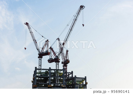 View of the building construction site with cranes in Taichung, Taiwan. View of the building construction site with cranes in Taichung, Taiwan. 95690141