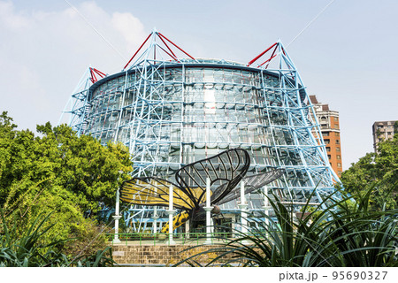 Low angle view of the Botanical Garden of National Museum of Natural Science in Taichung, Taiwan. Owns the largest tropical rainforest greenhouse in Taiwan. Low angle view of the Botanical Garden of National Museum of Natural Science in Taichung, Taiwan. Owns the largest tropical rainforest greenhouse in Taiwan. 95690327