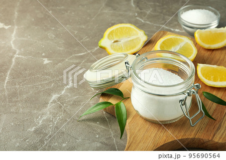 Concept of household cleaners with lemon acid Concept of household cleaners with lemon acid 95690564