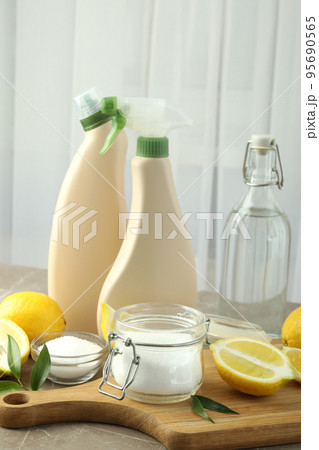 Concept of household cleaners with lemon acid Concept of household cleaners with lemon acid 95690565