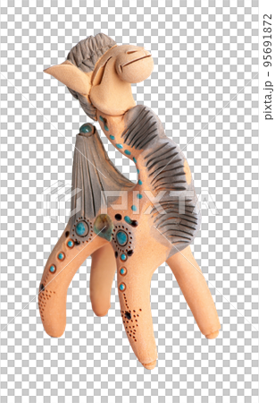 A camel, clay oriental souvenir on a white background 95691872