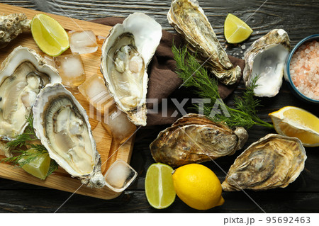 Concept of delicious seafood, oysters, top view Concept of delicious seafood, oysters, top view 95692463