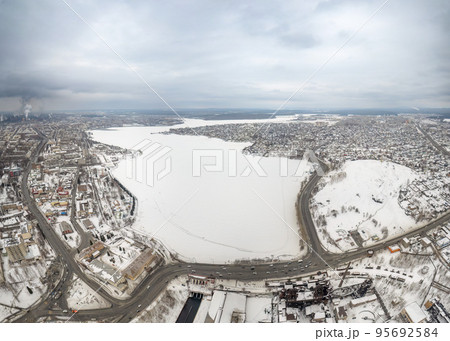 Winter view of the embankment of the city of Nizhny Tagil and the metallurgical plant from above. Environmental problem of environmental pollution and air in large cities Winter view of the embankment of the city of Nizhny Tagil and the metallurgical plant from above. Environmental problem of environmental pollution and air in large cities 95692584