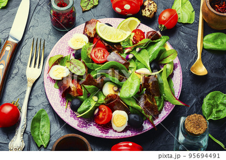 Healthy vegetable and bacon salad Healthy vegetable and bacon salad 95694491