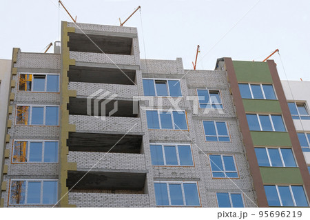 Building and Construction site of new home. House under construction. House under construction at building site. 95696219