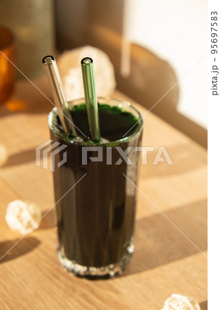 Blue-green algae Chlorella and spirulina powder. Super powder. Natural supplement of algae. Detox superfood drink cocktail. Food supplement source of protein and beta carotene 95697583