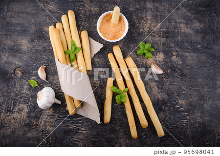Italian grissini, traditional appetizer breadstick Italian grissini, traditional appetizer breadstick 95698041