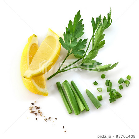 cut of lemon and parsley cut of lemon and parsley 95701409
