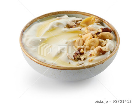 bowl of greek yogurt with honey and nuts bowl of greek yogurt with honey and nuts 95701412