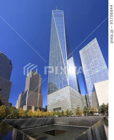 Freedom Tower and Memorial Fountain commemorating the September 11 attacks of 2001, located in lower Manhattan, stands 1,776 feet tall on the site of the former World Trade Center, New York City Freedom Tower and Memorial Fountain commemorating the September 11 attacks of 2001, located in lower Manhattan, stands 1,776 feet tall on the site of the former World Trade Center, New York City 95706844