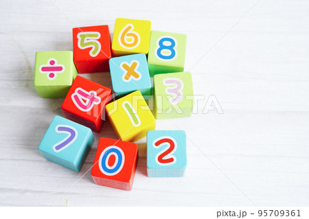 Number wood block cubes for learning Mathematic, education math concept. 95709361