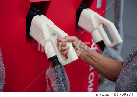 Electric car charging battery plug station for vehicle engine, clean energy parking. 95709374