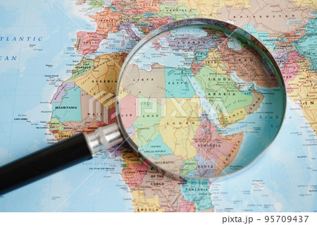 Bangkok, Thailand - May 15, 2022 Magnifying glass on world map. 95709437
