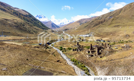 Ruined stone towers of an ancient civilization viewed from a height Ruined stone towers of an ancient civilization viewed from a height 95713734