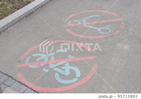 sign on the asphalt cycling is prohibited 95713903
