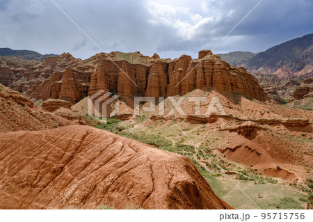 Red canyon Konorchek (Suluu-Terek) in the mountains in Kyrgyzstan Red canyon Konorchek (Suluu-Terek) in the mountains in Kyrgyzstan 95715756