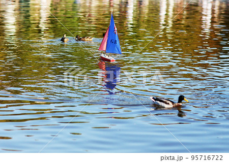 Photo on theme of lonely toy boat 95716722