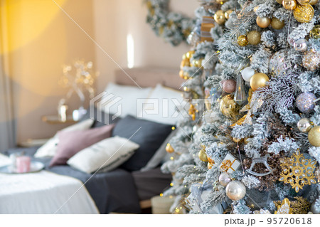 Christmas Tree with Decoration On A Winter Background With Bright Lights Christmas Tree with Decoration On A Winter Background With Bright Lights 95720618