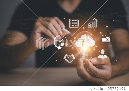 Businessman hold light bulbs with Cloud, ideas of new ideas with innovative technology and creativity, concept creativity with bulbs that shine glitter, businessman holding illuminated light bulb, 95722191
